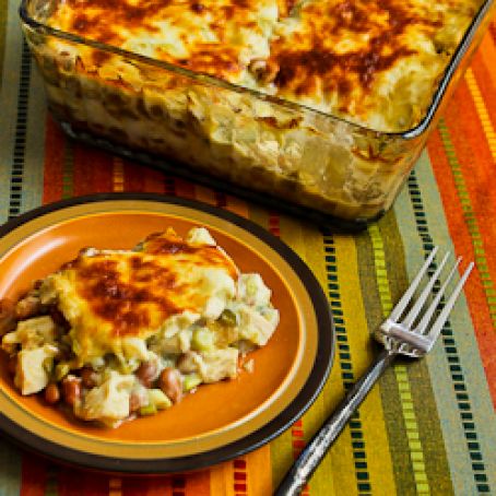 Layered Mexican Casserole with Chicken, Green Chiles, Pinto Beans, and Cheese