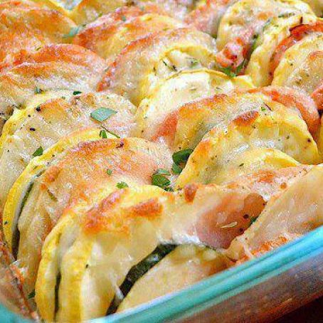 Vegetable Tian (thinly sliced veggies topped with cheese and then roasted)...