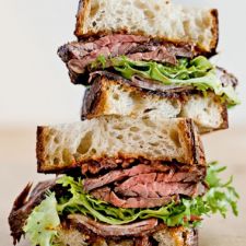 Hanger Steak & Bacon Sandwich With Frisée & Red Onion Jam 
