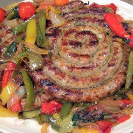 Grilled Sausage Ring With Parsley and Provolone Over Pepperonata