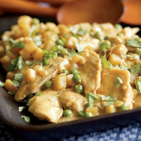 Chicken with Potatoes, Peas & Coconut-Curry Sauce