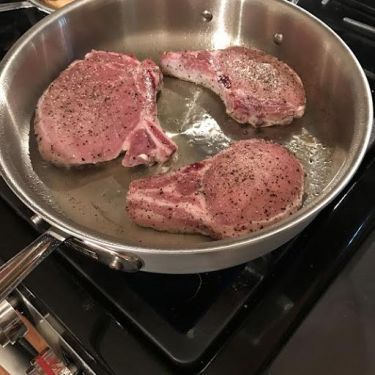 the ultimate pork chops with polenta, onion agrodolce, fried sage & roasted pears