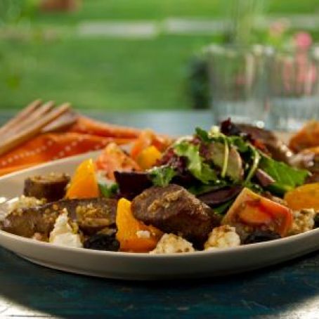 Grilled Lamb Sausage with Goat Cheese, Heirloom Tomatoes, Olives and Herbs