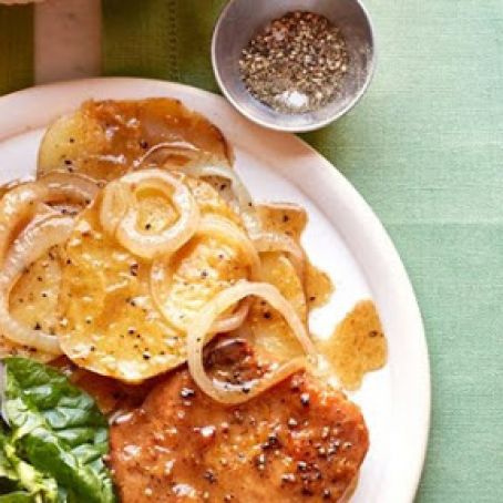 SKILLET PORK CHOPS WITH POTATOES AND ONIONS