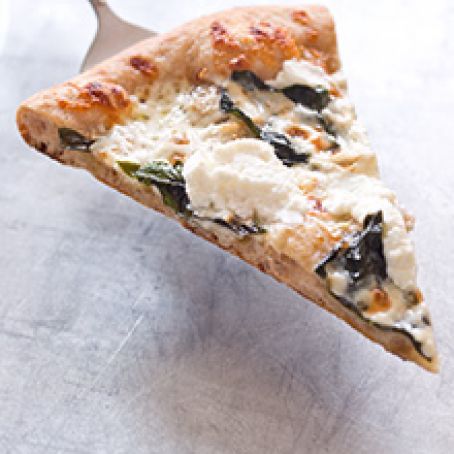 Thin-Crust Whole-Wheat Pizza with Garlic Oil, Three Cheeses, and Basil