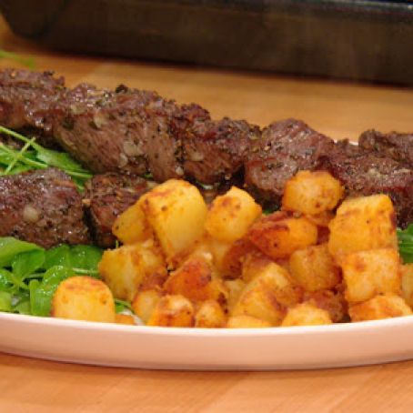 Garlicky Beef Skewers with Potato Hash & Spiked Ketchup