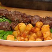 Garlicky Beef Skewers with Potato Hash & Spiked Ketchup