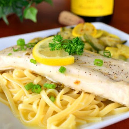 Grilled Fish With Garlic, White Wine and Butter Sauce