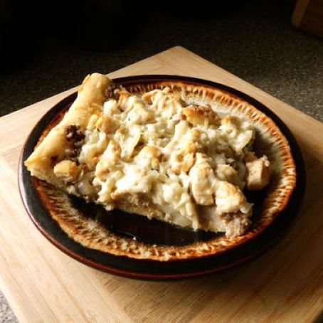 Mushroom asiago onion and chicken pizza with truffle oil