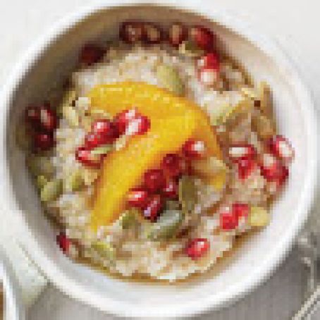 Steel-Cut Oats with Orange, Pomegranate Seeds, Pepitas, and Maple Syrup