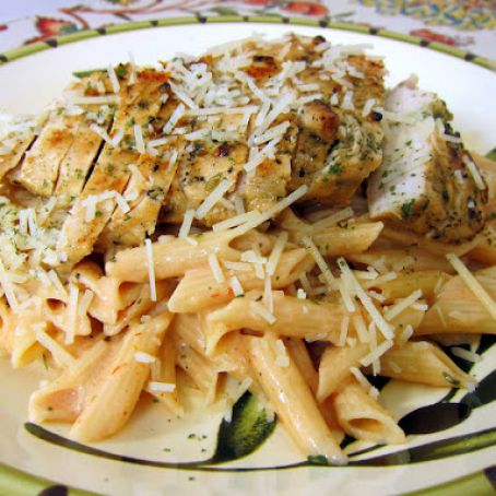 Grilled Chicken over Tomato Alfredo Sauce