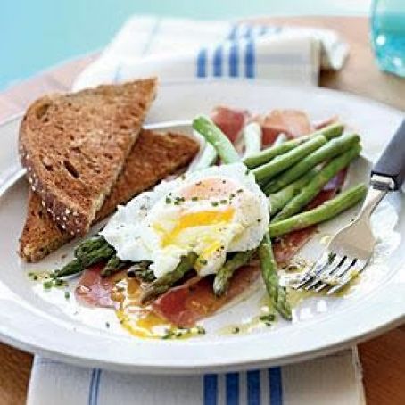 Asparagus Salad with Soft poached Eggs, Prosciutto, and Lemon-Chive Vinaigrette
