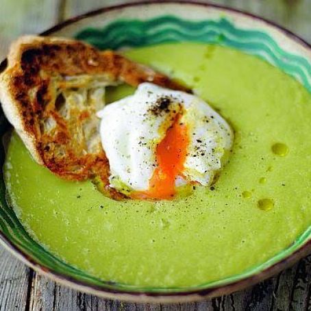 Creamy asparagus soup with a poached egg on toast