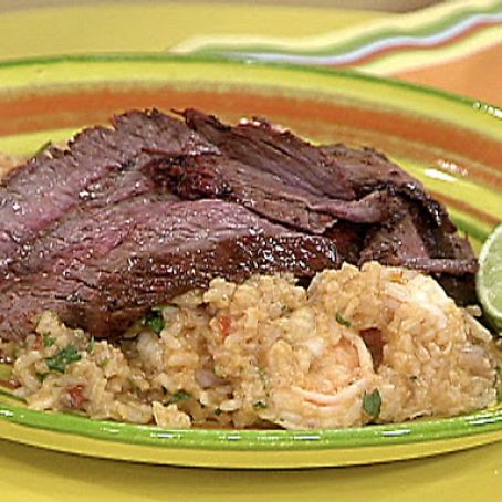 Sliced Chili Rubbed Flank Steak on Spicy Rice with Shrimp