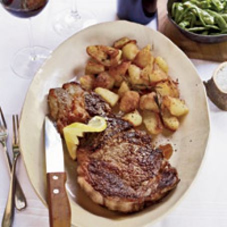 Grilled Rib-Eye Steaks with Roasted Rosemary Potatoes