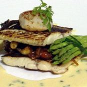 Seared Fillet of Seabass with Tomato and Onion Confit and Sherry Vinegar Nage Infused with Tarragon