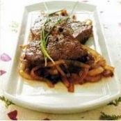 Bisteces encebollados