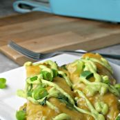 Green enchiladas with avocado cream