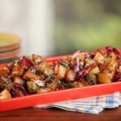 Cast-Iron Home Fries with Roasted Green Chiles, Cilantro, Green Onions, Radicchio, and Creamy Garlic Dressing