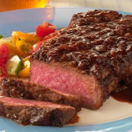 Strip Steaks with Bourbon-Molasses Barbecue SauceRecipe by Jamie Purviance