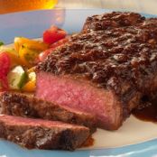 Strip Steaks with Bourbon-Molasses Barbecue SauceRecipe by Jamie Purviance