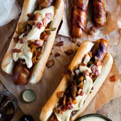 BACON WRAPPED HOT DOGS WITH CHEESE SAUCE