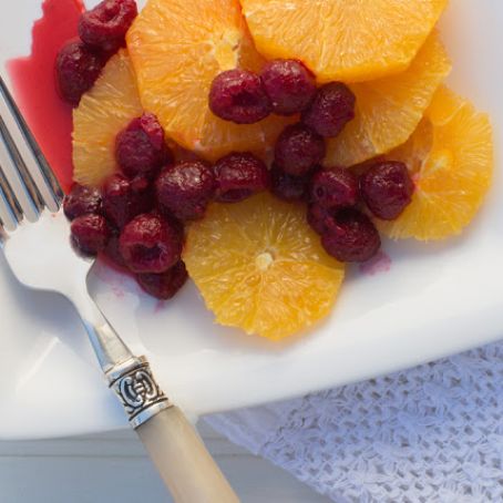 Orange Slices with Warm Cinnamon Raspberries