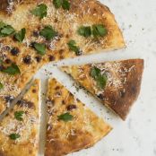 RICOTTA SALATA-STUFFED FLATBREAD WITH SHALLOTS (CICCIO)