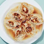 Spicy Beef Pan-Fried Dumplings Recipe | SAVEUR