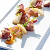 Heirloom apple with curry and ginger prosciutto salad