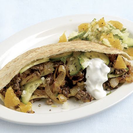 Lamb and Sweet Onion Pitas with Orange-Cucumber Salad