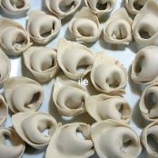 AGNOLOTTIS CON SALSA AL GUSTO