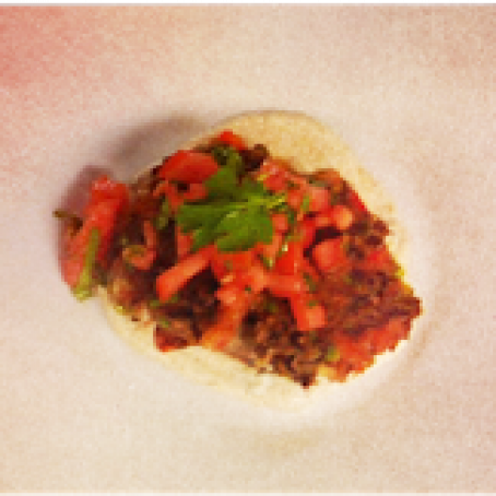 Black Bean Cakes with Florida Tomatoes and Spicy Yogurt Sauce