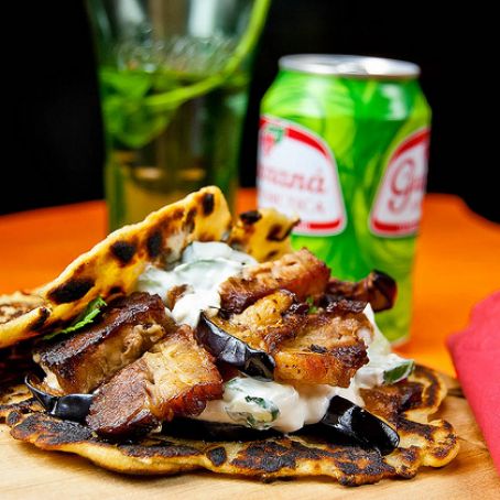 Crispy Pork-Belly Gyros with fried eggplants in a potato-onion flatbread