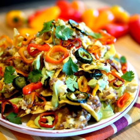 Breakfast Nachos with Fluffy Eggs, Avocado Cream & Roasted Peppers