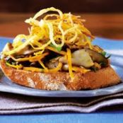 Mushroom Bruschetta with Crispy Onion Haystack