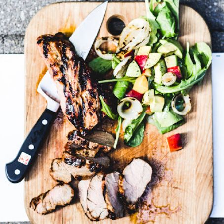 pork tenderloin grilled w/wilted greens, sweet onions + peach vinaigrette