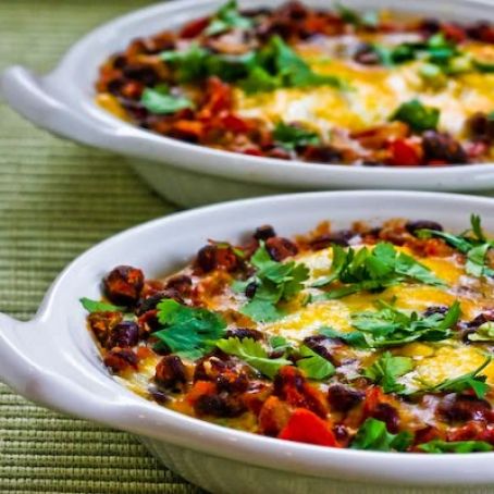 Mexican Baked Eggs with Black Beans, Tomatoes, Green Chiles, and Cilantro