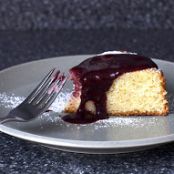 lime yogurt cake with blackberry sauce