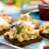 Open-Faced Egg Salad Tea Sandwiches with Crab and Poppy Seeds on Pumpernickel