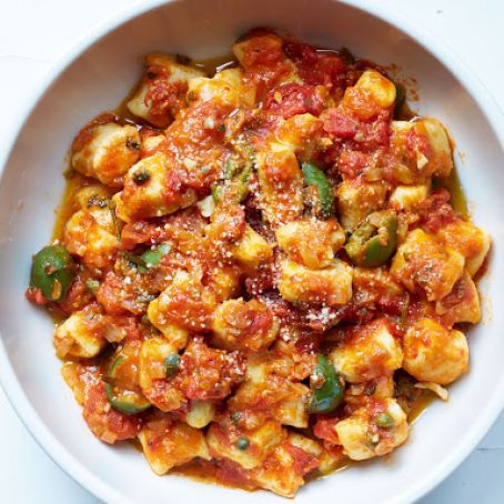 Ricotta and Egg Gnocchi With Olives, Capers, and Tomato Sauce