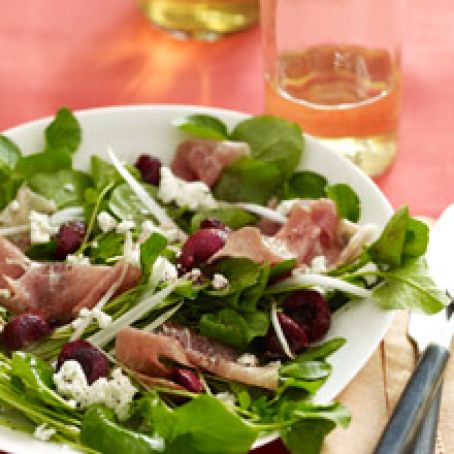 Salad of Spicy Greens, Proscuitto, Goat Cheese & Cranberries