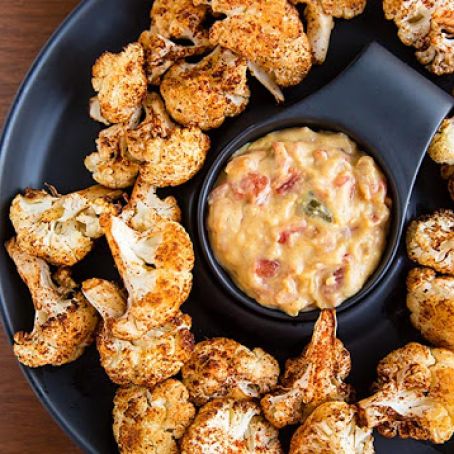 Roasted Cauliflower Bites with Vegan Nacho Cheese Sauce