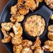 Roasted Cauliflower Bites with Vegan Nacho Cheese Sauce