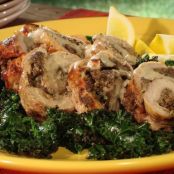 Stuffed Pork Tenderloin over Grilled Kale drizzled with Grilled Peach Whiskey Beurre Blanc