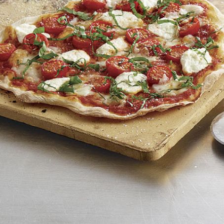 Cracker-Thin Pizza with Cherry Tomatoes, Fresh Mozzarella, Ricotta, and Basil