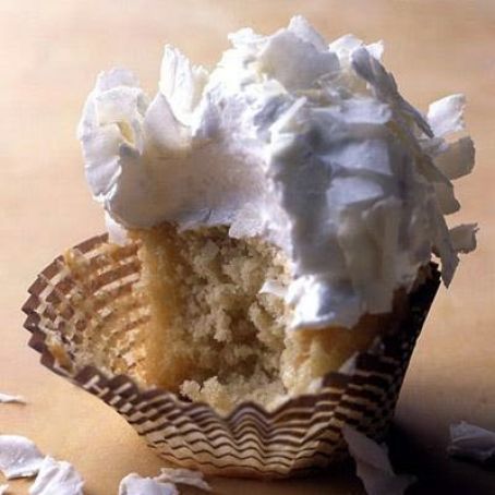 Coconut Cupcakes with Seven Minute Frosting and Coconut Flakes