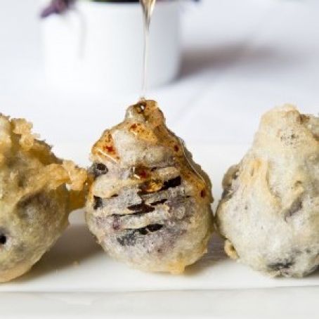 Crispy Fried Goat Cheese Stuffed Figs with Spicy Honey