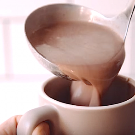 Slow-Cooker Hot Chocolate with Frozen Whipped Cream Dollops