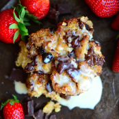 Sourdough Bread Pudding with Chocolate Chunks and Vanilla Cream Sauce